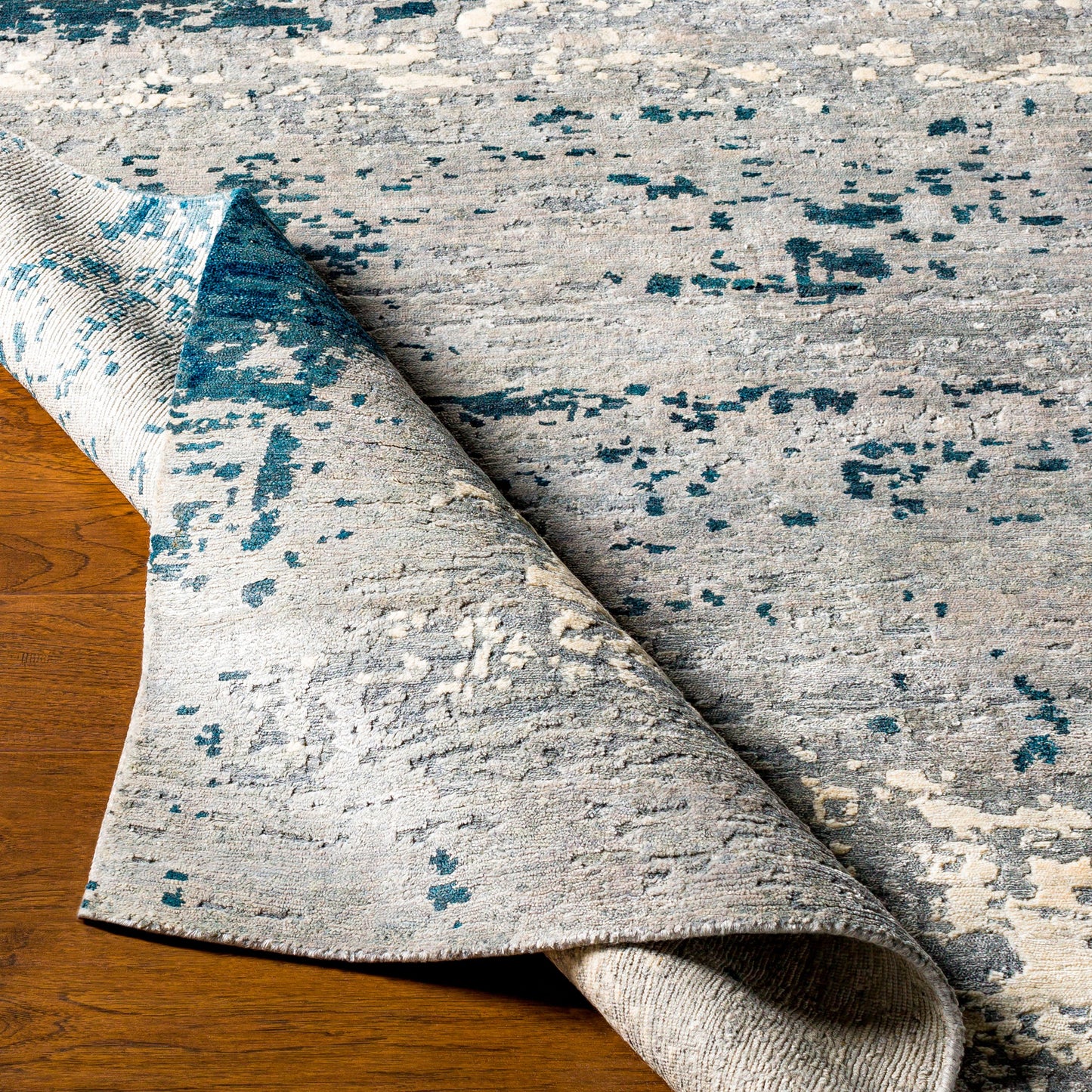 007 SR-882693,SR-882694,SR-882695 | Closeup | Imola Rug - 26077 by Surya in light beige, gray, light gray, dark blue, teal, charcoal. Made from 90% viscose, 10% nz wool in a unique style.