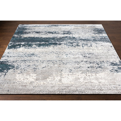 Imola Rug - 26077 by Surya in light beige, gray, light gray, dark blue, teal, charcoal. Made from 90% viscose, 10% nz wool in a unique style.