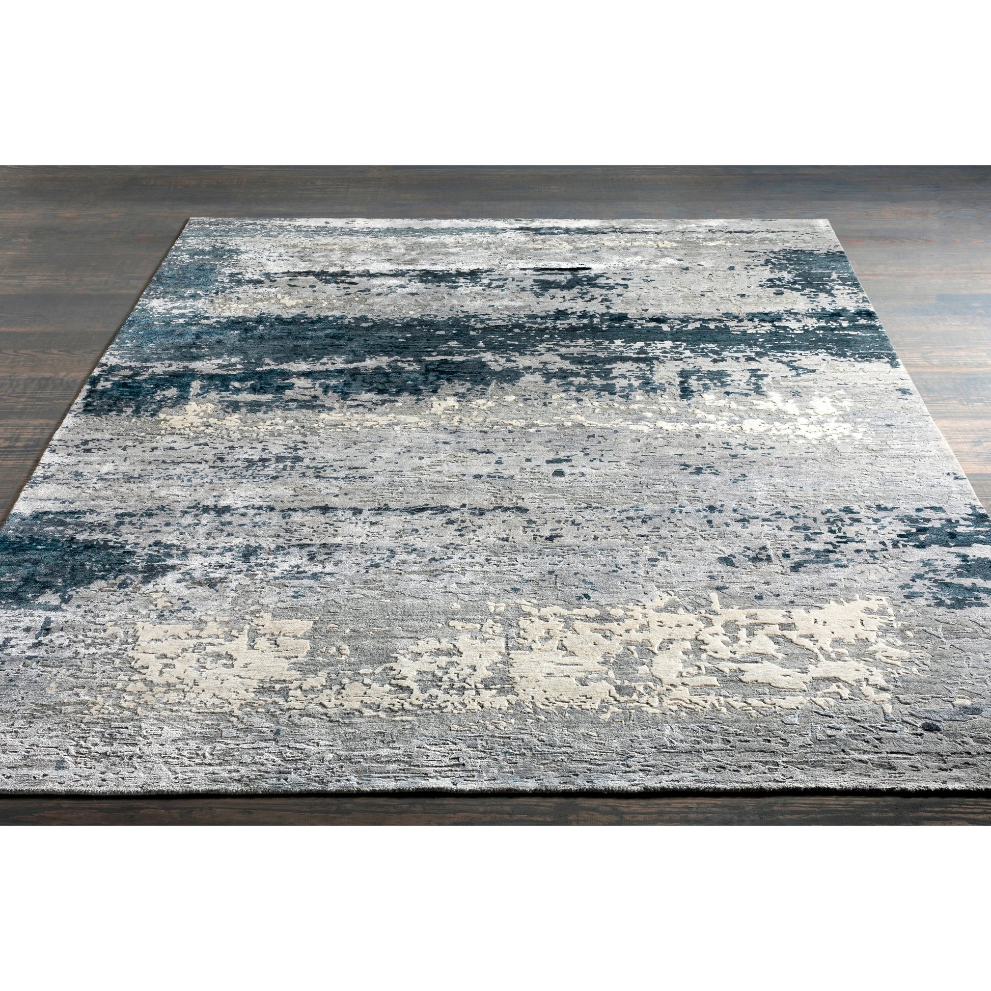 Imola Rug - 26077 by Surya in light beige, gray, light gray, dark blue, teal, charcoal. Made from 90% viscose, 10% nz wool in a unique style.