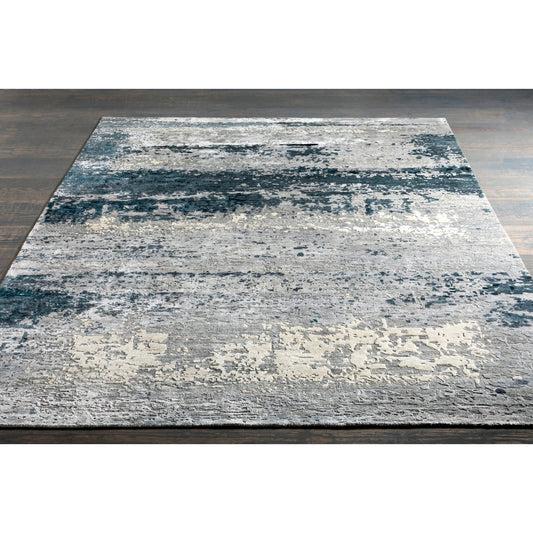 Imola Rug - 26077 by Surya in light beige, gray, light gray, dark blue, teal, charcoal. Made from 90% viscose, 10% nz wool in a unique style.