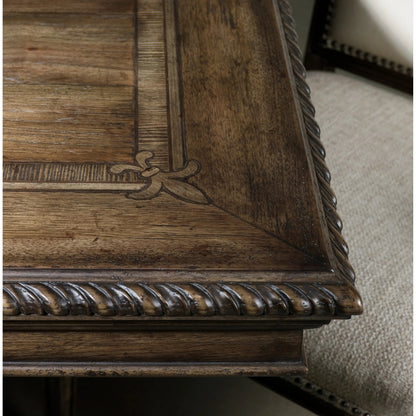 Rhapsody Rectangle Dining Table by Hooker Furniture in rustic walnut. Made from pecan, hickory, ash, black walnut, maple veneers with resin in a traditional style.