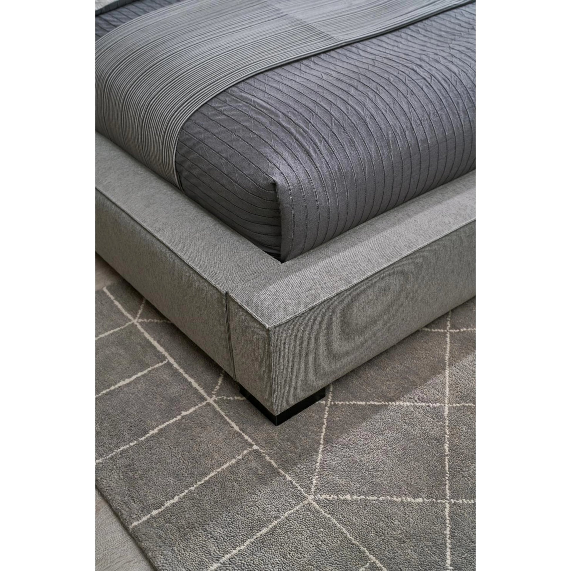 Zest Wide Upholstered Bed by Zest. Made from rubberwood, fabric in a modern style.
