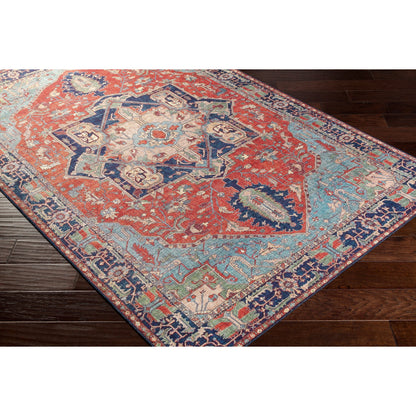 Iris Rug by Livabliss in red, burnt orange, dark blue, ink blue, pale blue, green. Made from 100% polyester in a traditional style.