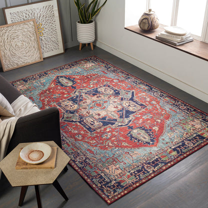 Iris Rug by Livabliss in red, burnt orange, dark blue, ink blue, pale blue, green. Made from 100% polyester in a traditional style.