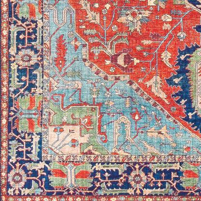 Iris Rug by Livabliss in red, burnt orange, dark blue, ink blue, pale blue, green. Made from 100% polyester in a traditional style.