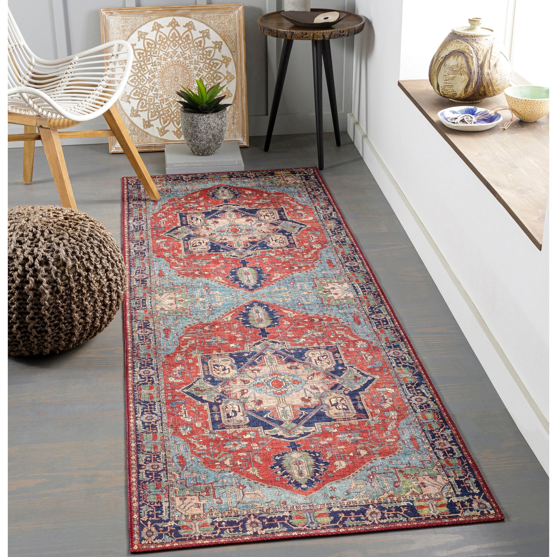 Iris Rug by Livabliss in red, burnt orange, dark blue, ink blue, pale blue, green. Made from 100% polyester in a traditional style.
