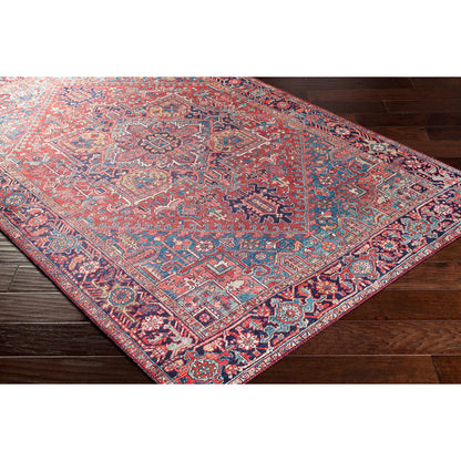 Iris Rug by Livabliss in dark blue, red, tan, teal, cream. Made from 100% polyester in a traditional style.