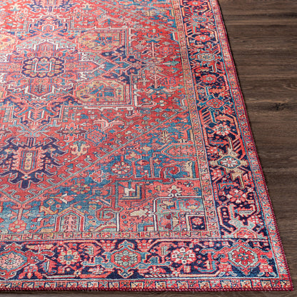 Iris Rug by Livabliss in dark blue, red, tan, teal, cream. Made from 100% polyester in a traditional style.