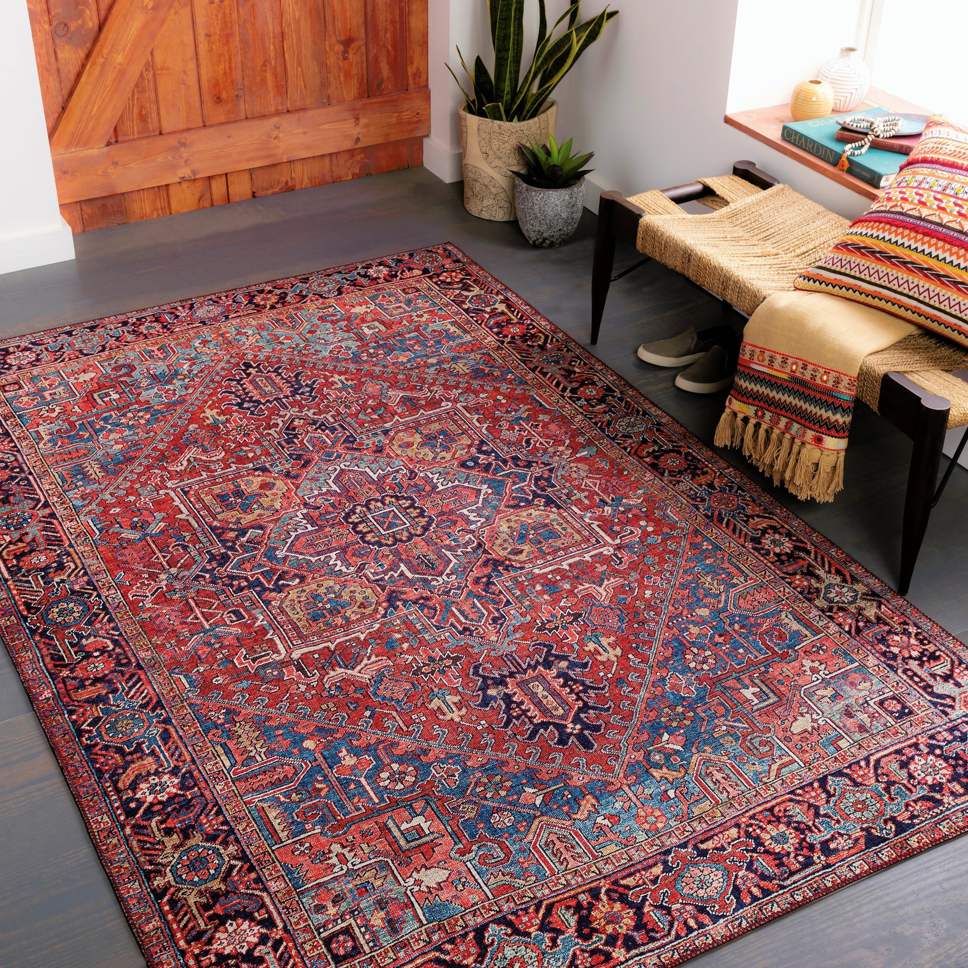 Iris Rug by Livabliss in dark blue, red, tan, teal, cream. Made from 100% polyester in a traditional style.