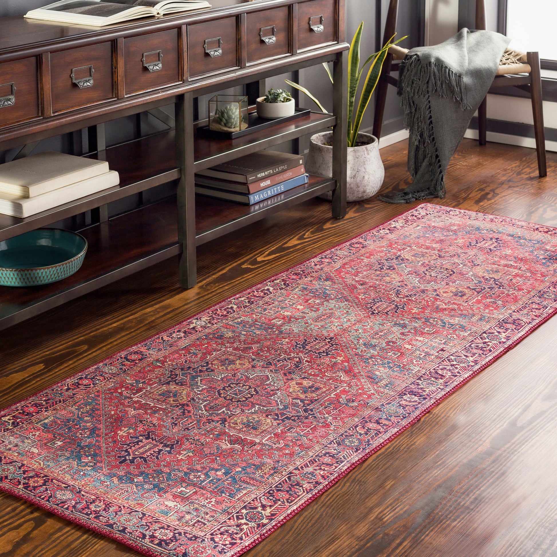 Iris Rug by Livabliss in dark blue, red, tan, teal, cream. Made from 100% polyester in a traditional style.