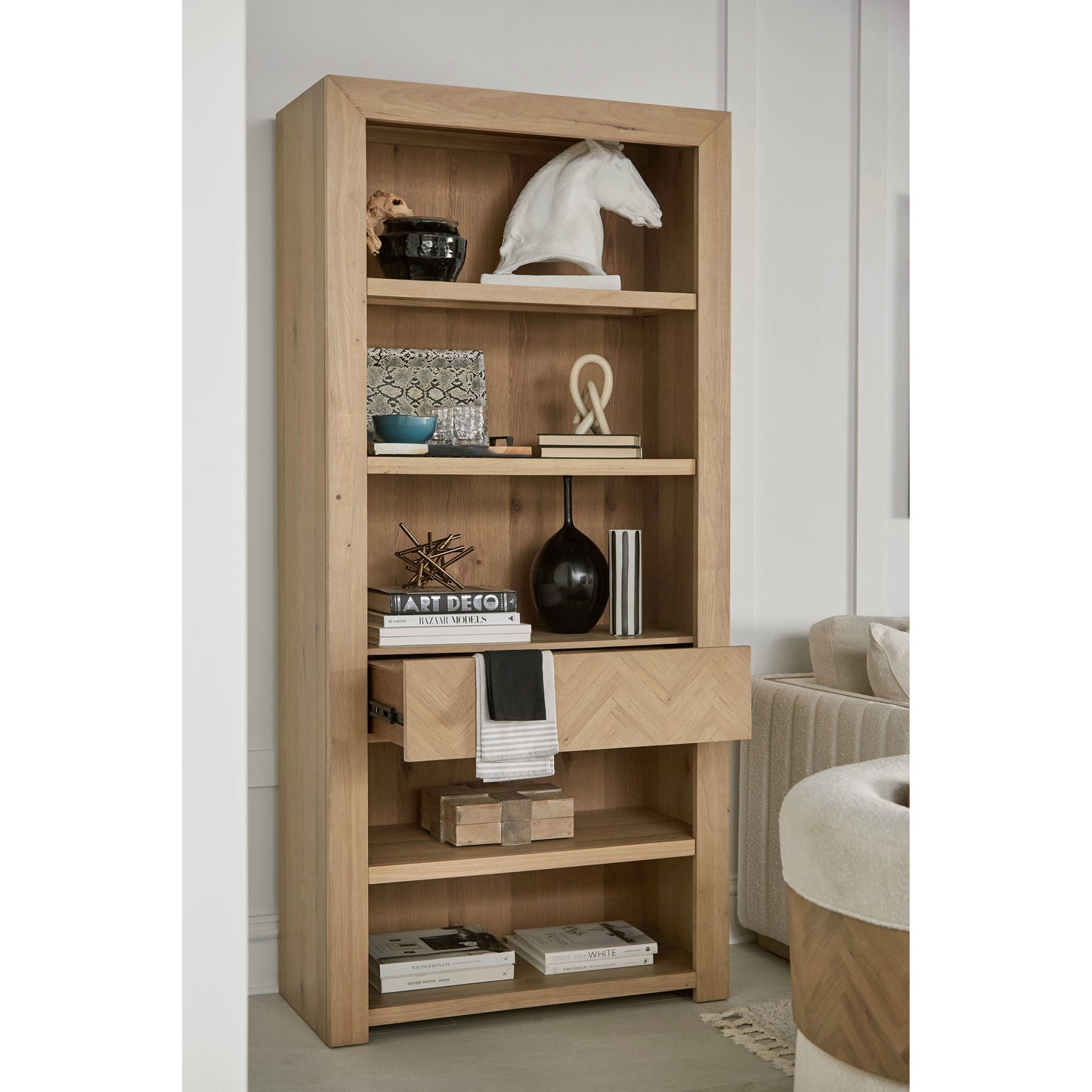 005 SI-2155781 | Lifestyle | Garrison Bookcase by A.R.T. Furniture in washed oak. Made from parawood solids with ash embossing, white oak veneers, glass in a modern style.