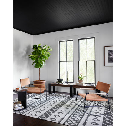 Griffon Side Table by Four Hands in rustic fossil. Made from iron in a modern style.