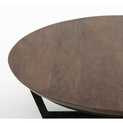 Felix Round Coffee Table by Four Hands. Made from unique in a modern style.