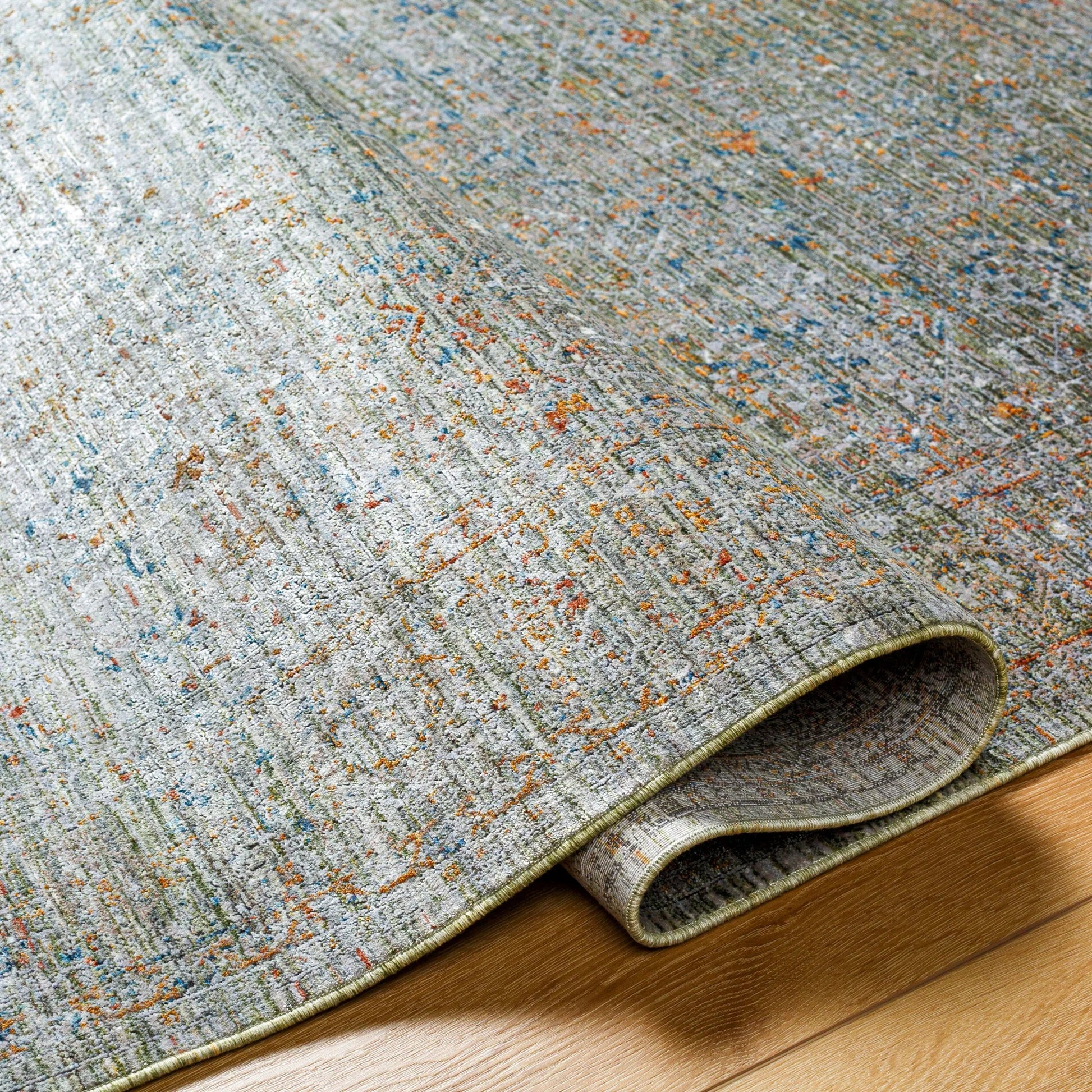 Isfahan Rug - 32671 by Surya in olive, gray, black, rust, dark blue, tan. Made from main: 73% viscose, main: 20% polyester, main: 7% acrylic in a unique style.