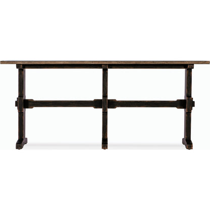Americana Trestle Console Table by Hooker Furniture in black and molasses finish. Made from oak veneers with solid-wood edge top in a modern style.