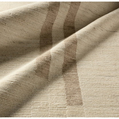 In The Distance ITD02 Rug by Jaipur Living in ivory, white, tan, taupe. Made from 100% wool in a unique style.