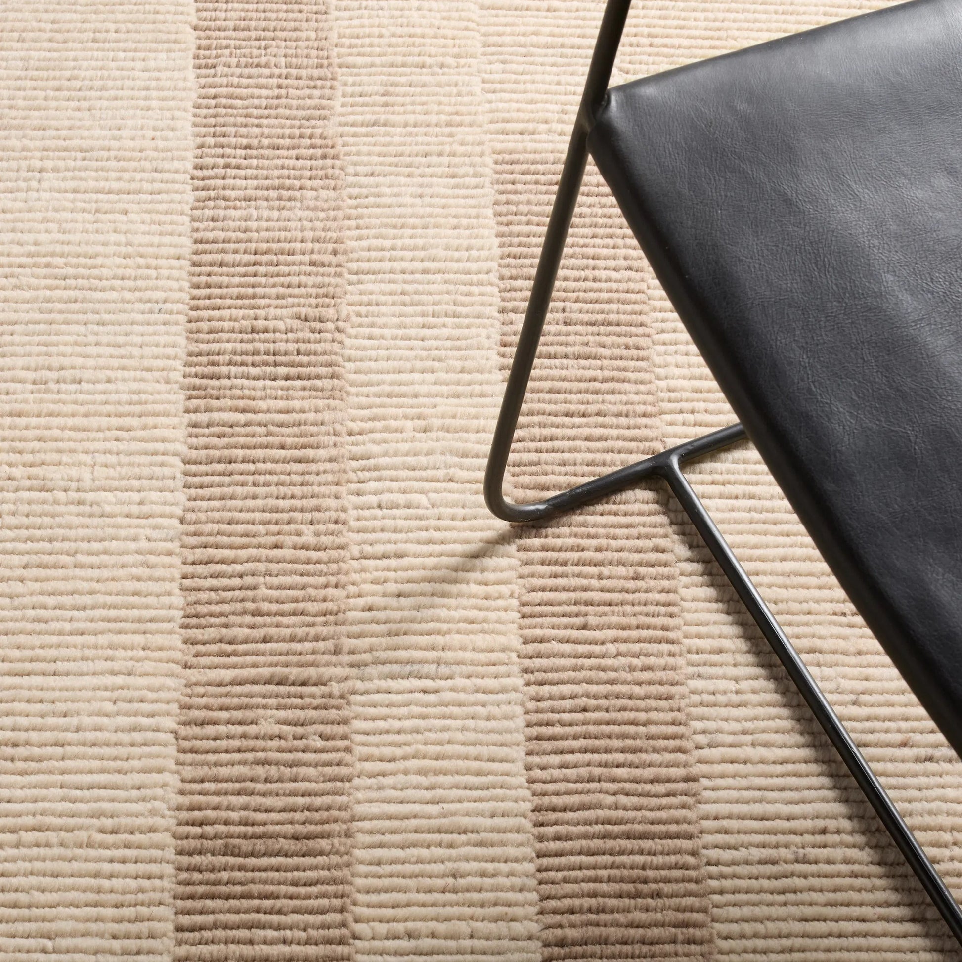 In The Distance ITD02 Rug by Jaipur Living in ivory, white, tan, taupe. Made from 100% wool in a unique style.