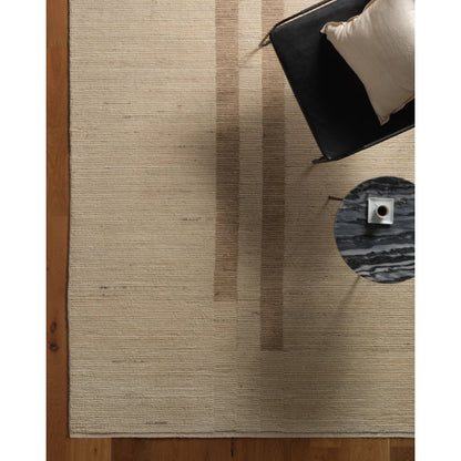 In The Distance ITD02 Rug by Jaipur Living in ivory, white, tan, taupe. Made from 100% wool in a unique style.