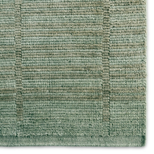 In The Distance ITD04 Rug by Jaipur Living in green. Made from 100% wool in a unique style.