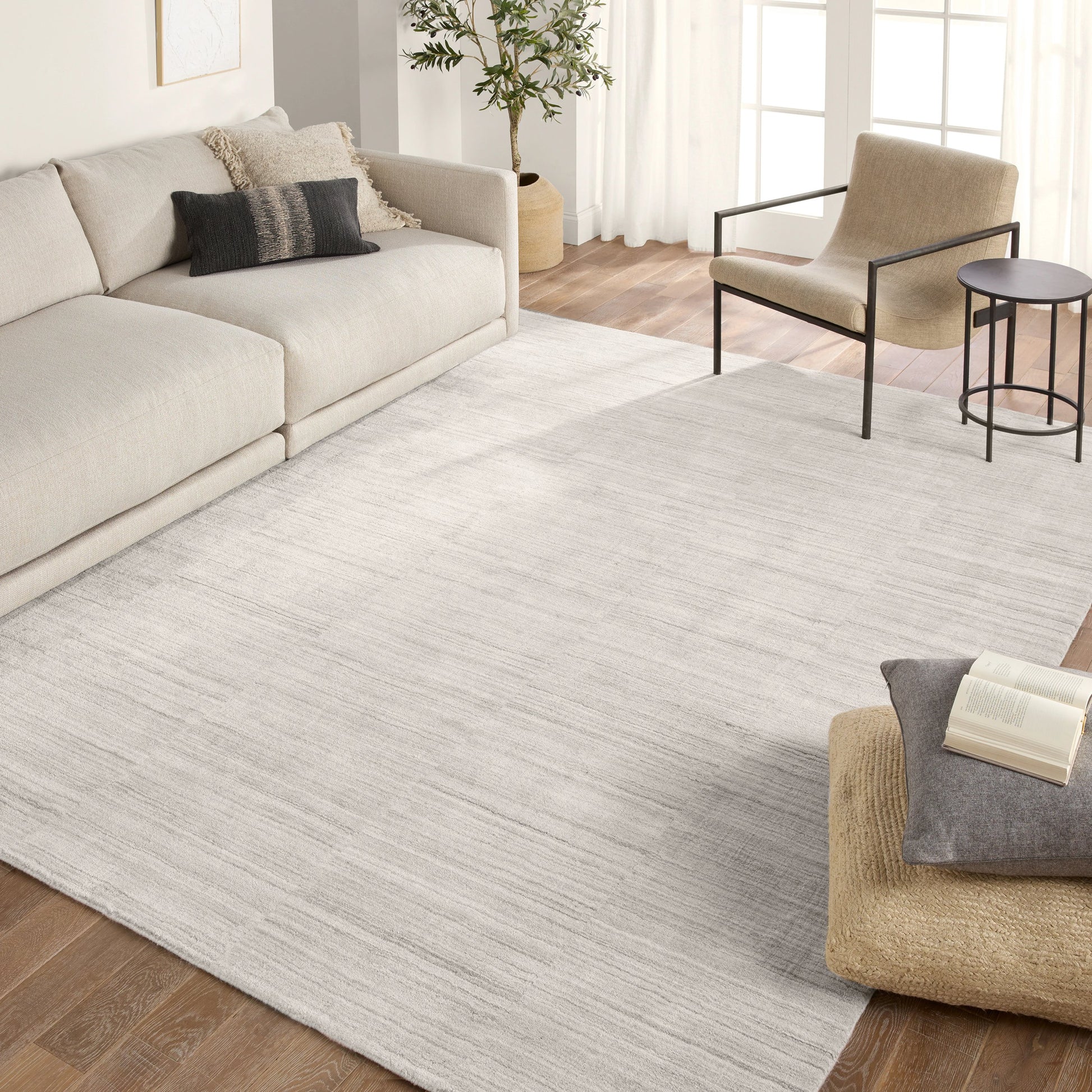 Ivar Irini Rug by Jaipur Living in light gray, white. Made from 100% polyester in a unique style.