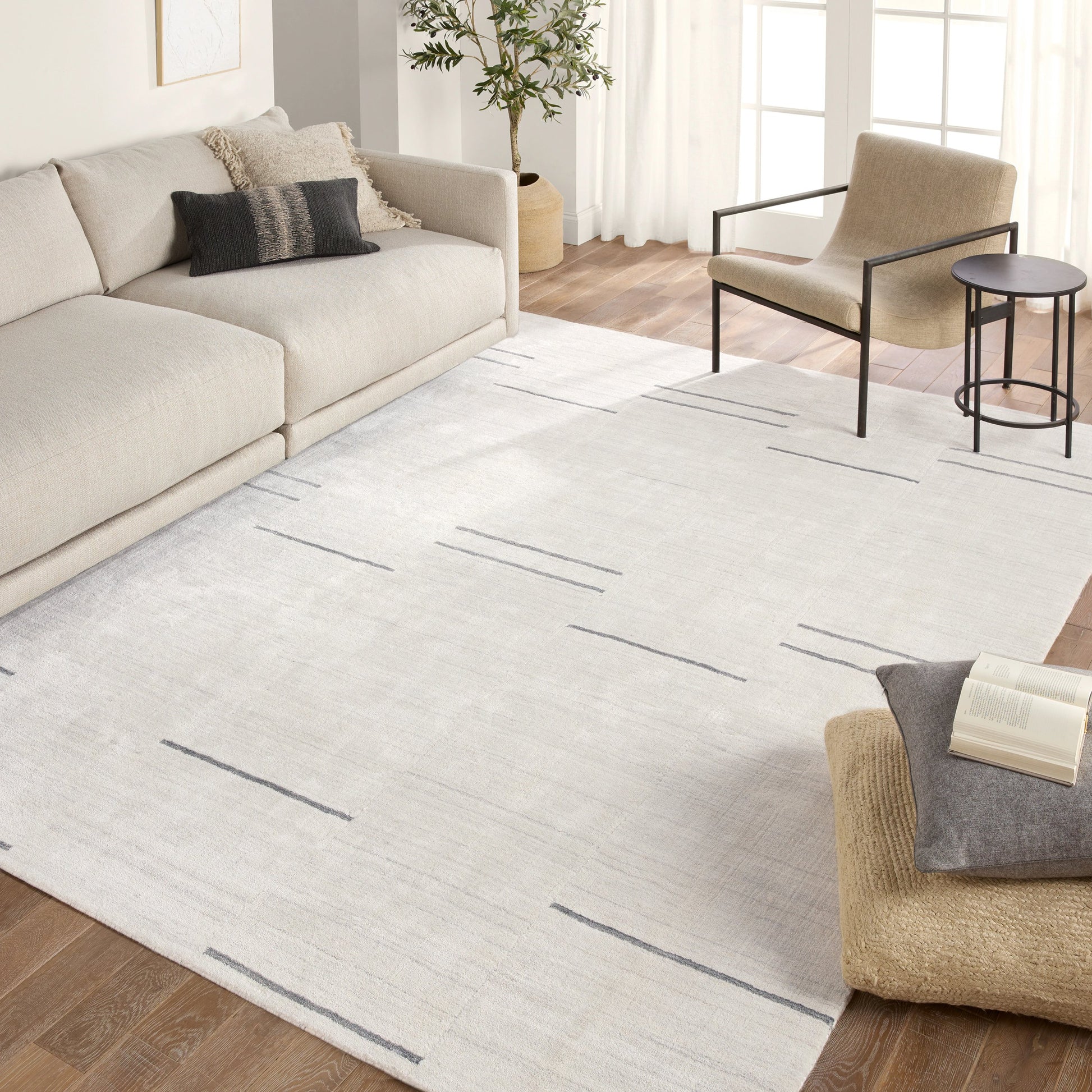 Ivar Tinsin Rug by Jaipur Living in gray, ivory. Made from 100% polyester in a unique style.