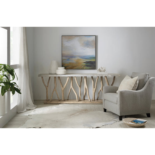 Surfrider Console Table by Hooker Furniture in light natural wood. Made from pecan veneers with stone veneer, resin in a modern style.