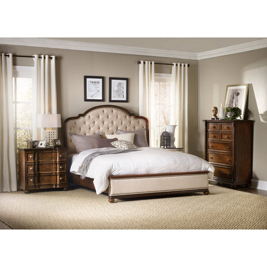 Leesburg Upholstered Bed by Hooker Furniture in alabaster and mahogany. Made from hardwoods with fabric, nailheads in a traditional style.