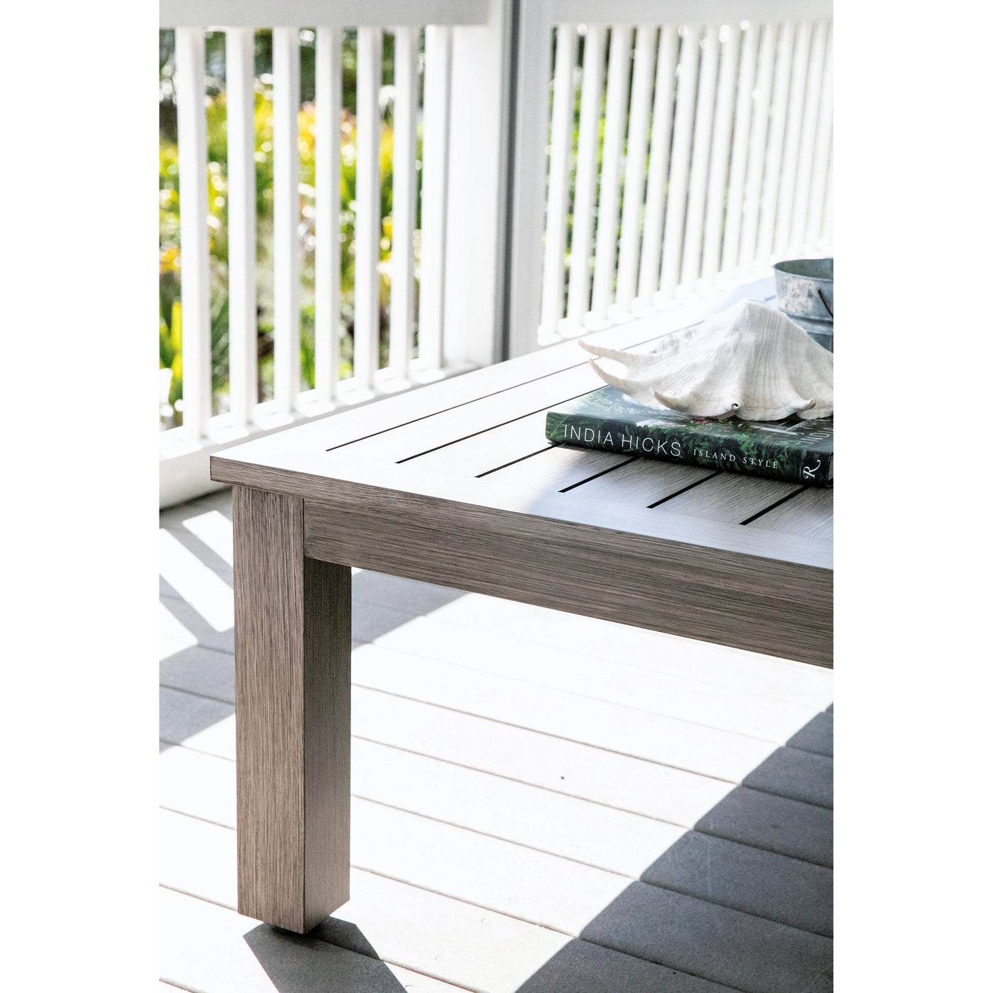 008 SI-2166958 | Lifestyle | Laguna Outdoor Coffee Table by Sunset West in driftwood. Made from aluminum in a modern style.