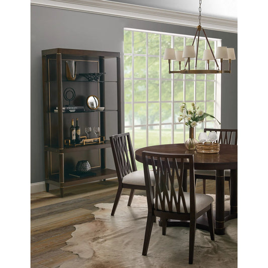 Asher Park Round Dining Table by Pulaski Furniture in piano brown. Made from eucalyptus veneers in a unique style.