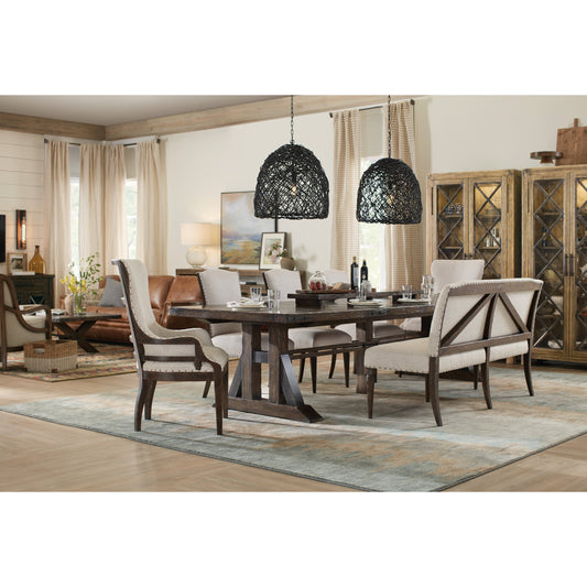 Roslyn County Trestle Dining Table by Hooker Furniture in dark walnut. Made from black walnut veneers, aluminum sheet in a traditional style.
