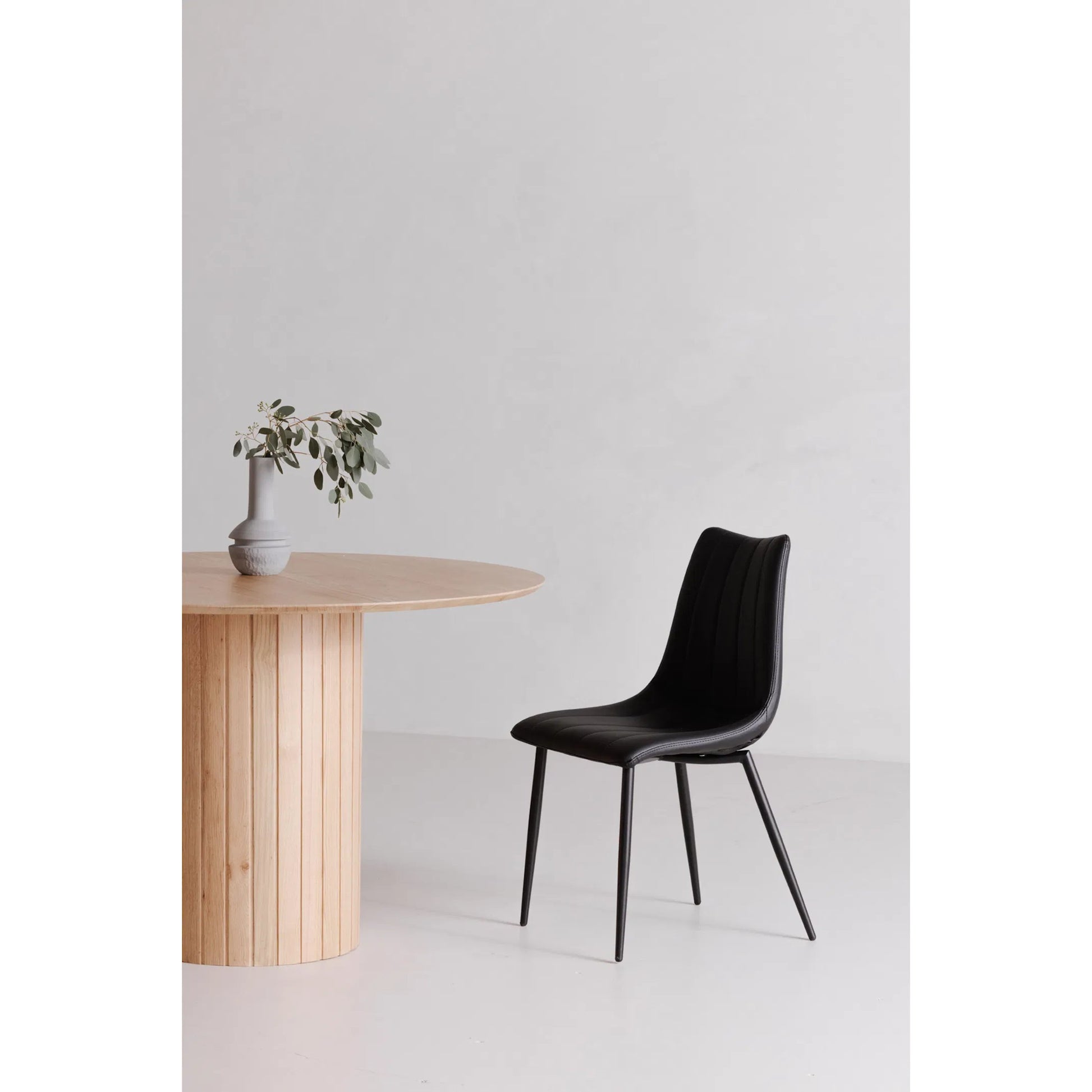Povera Round Dining Table by Moe's Home Collection in black. Made from solid acacia wood in a modern style.