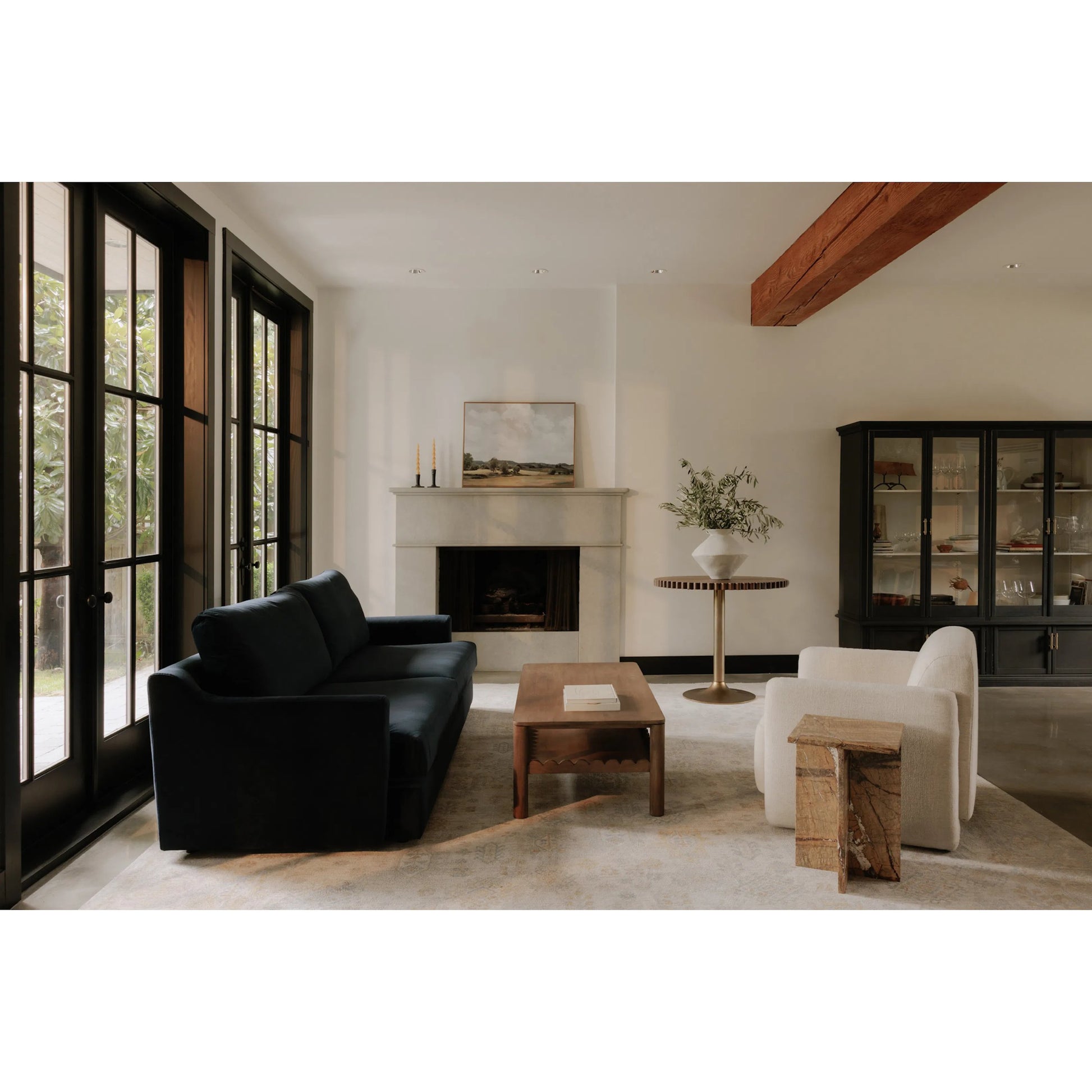 Nomi Cafe Table by Moe's Home Collection. Made from solid oak top, antiqued, brass iron base, cast iron bottom in a transitional style.