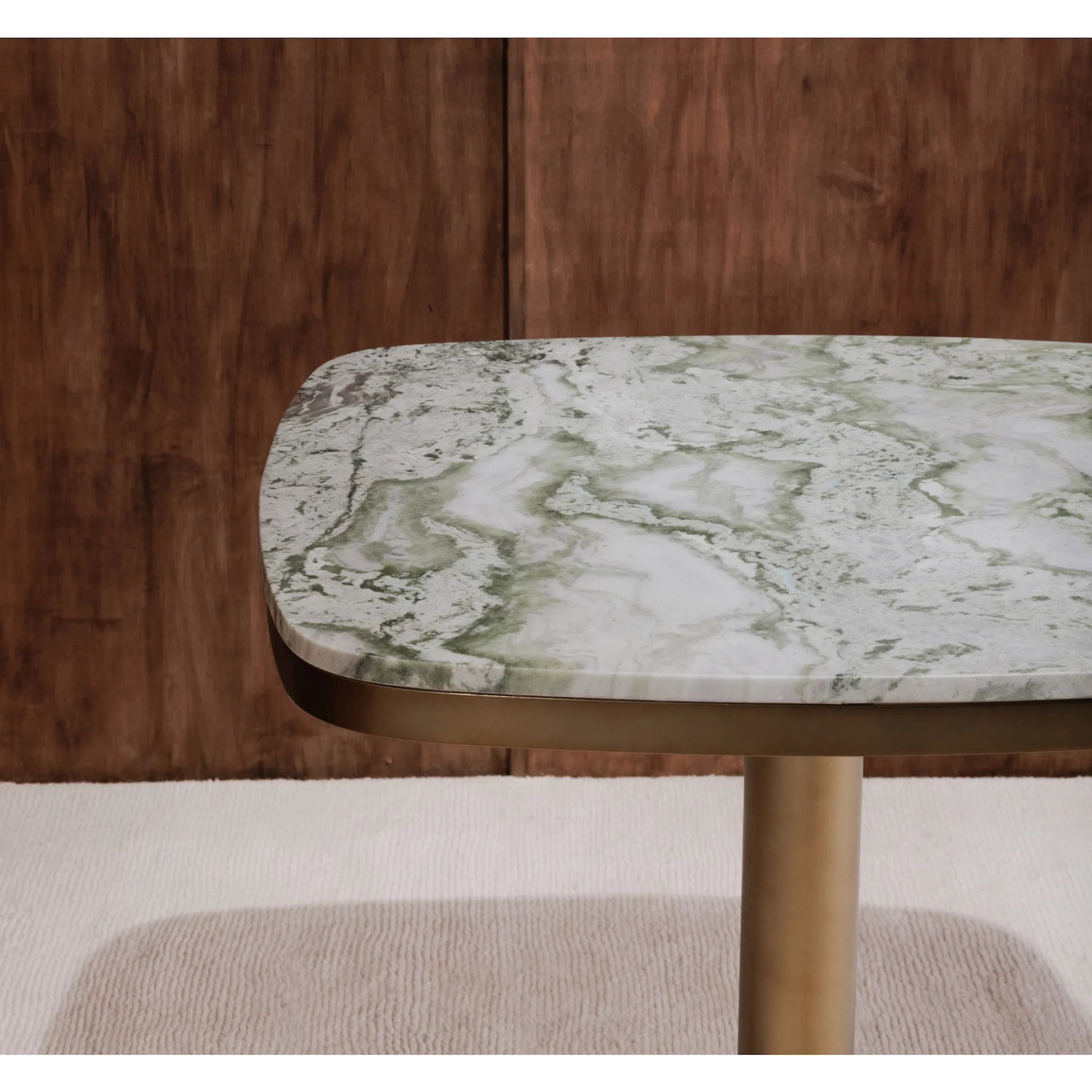 Celeste Cafe Table by Moe's Home Collection in natural, antique brass. Made from marble top, antiqued, brass iron base, mdf underneath marble for top support in a modern style.
