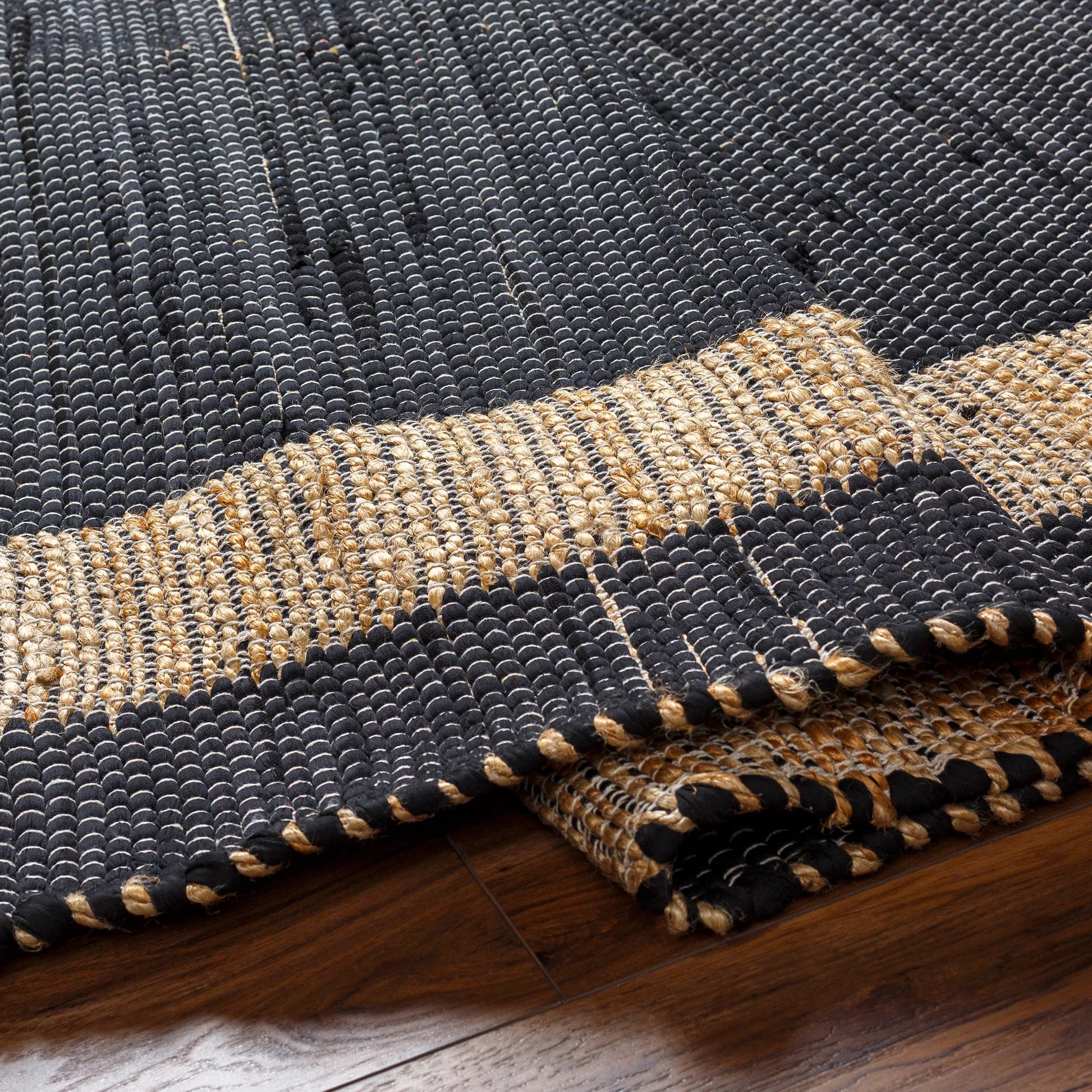 Jean Rug - 32470 by Livabliss. Made from main: 60% recycled fabric, main: 40% jute in a unique style.