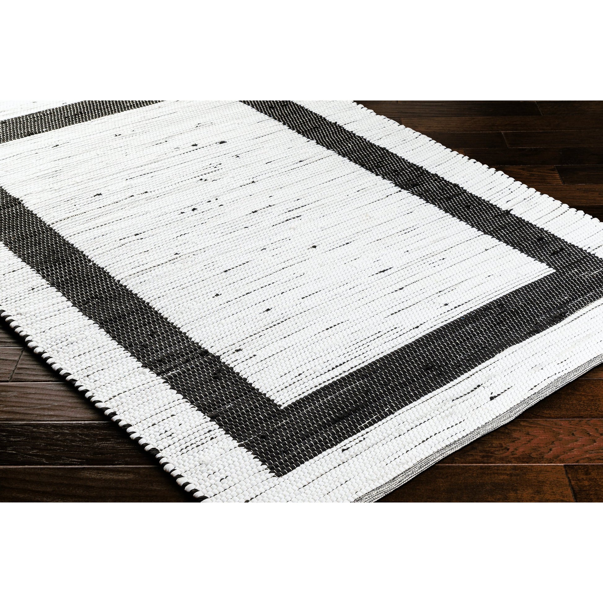 Jean Rug - 32471 by Livabliss in ivory, black. Made from main: 100% recycled fabric in a unique style.