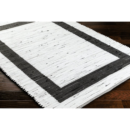 Jean Rug - 32471 by Livabliss in ivory, black. Made from main: 100% recycled fabric in a unique style.
