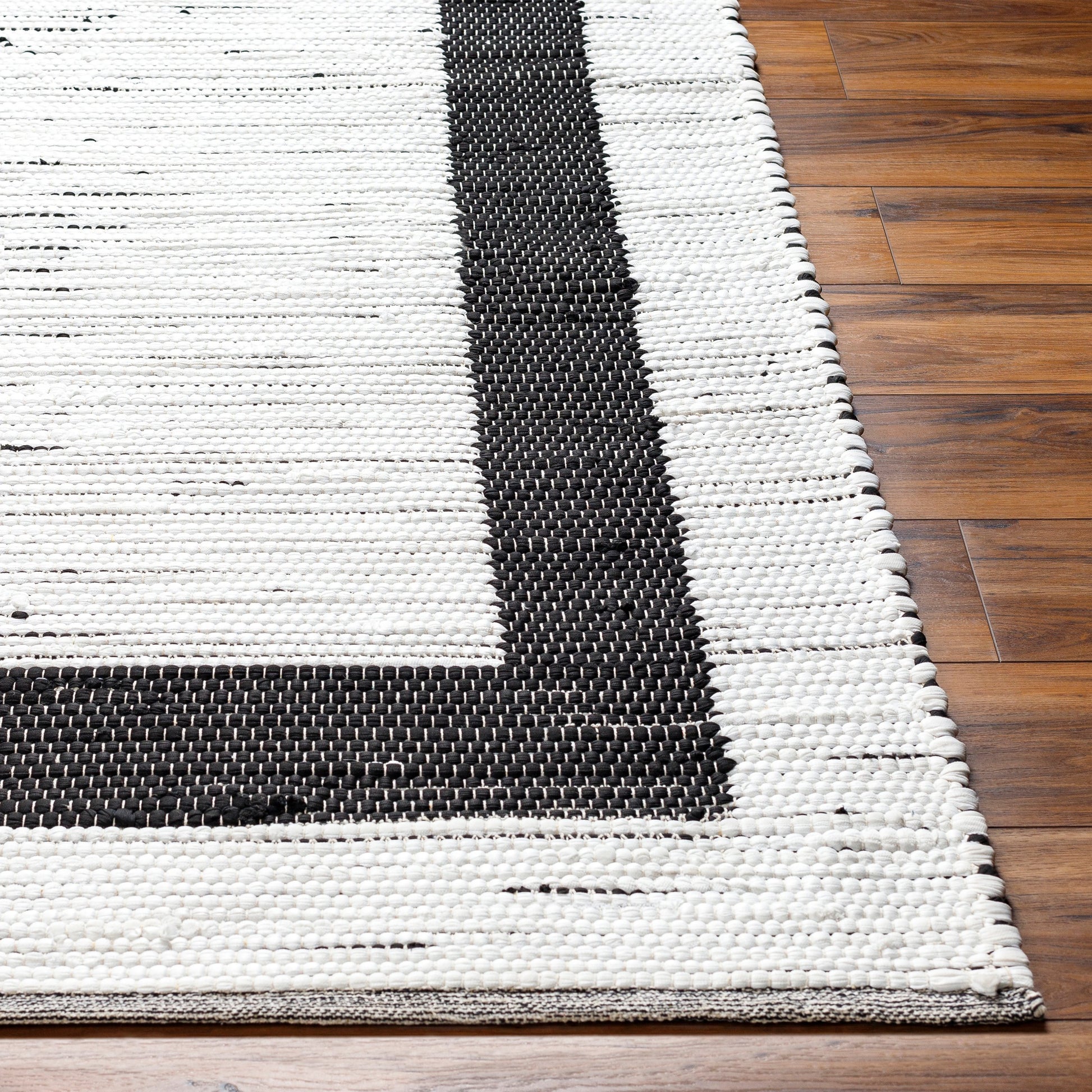 Jean JEA-2303 Rug by Livabliss in ivory, black. Made from main: 100% recycled fabric in a unique style.