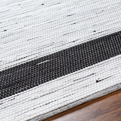 Jean Rug - 32471 by Livabliss in ivory, black. Made from main: 100% recycled fabric in a unique style.