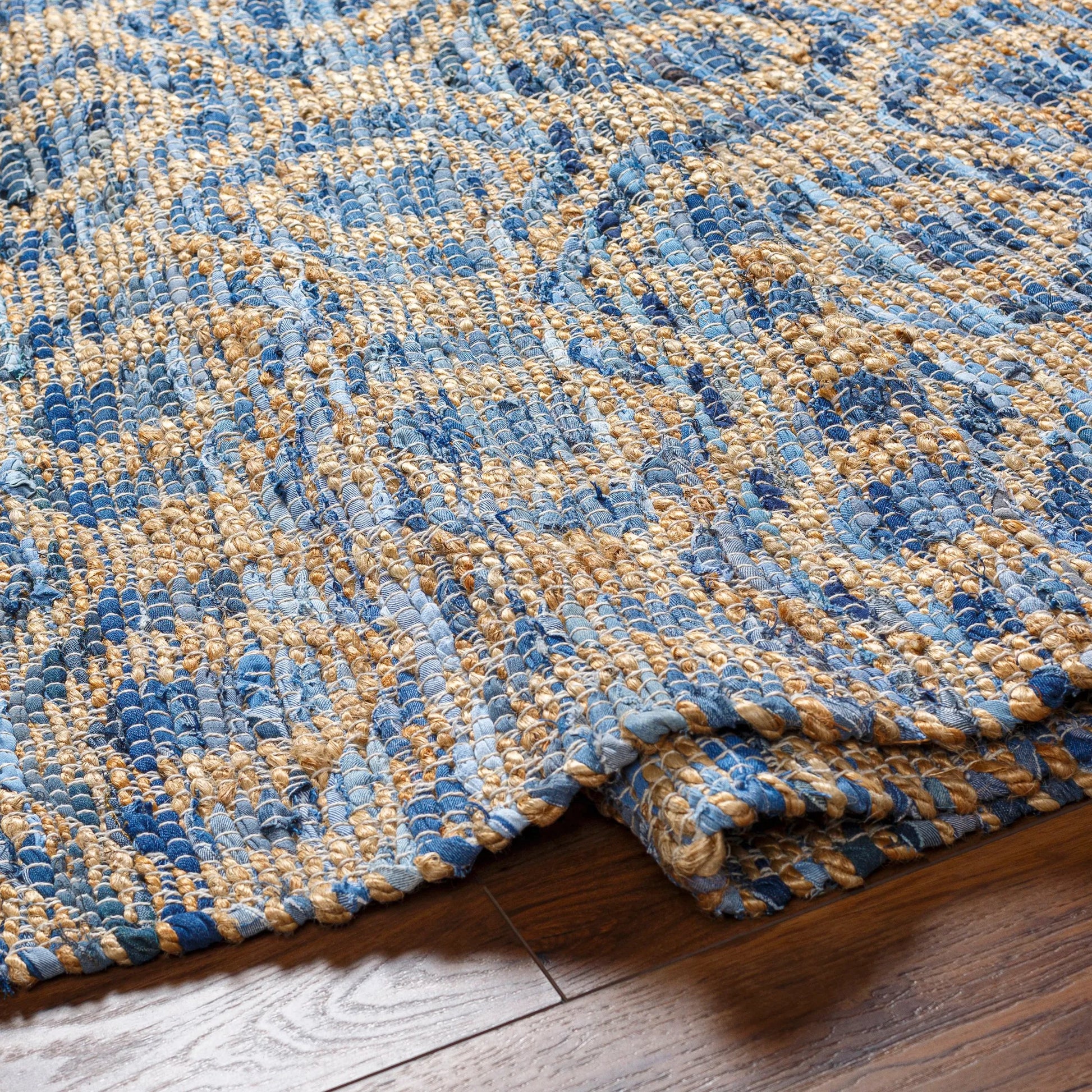 Jean Rug - 32472 by Livabliss. Made from main: 60% recycled fabric, main: 40% jute in a unique style.