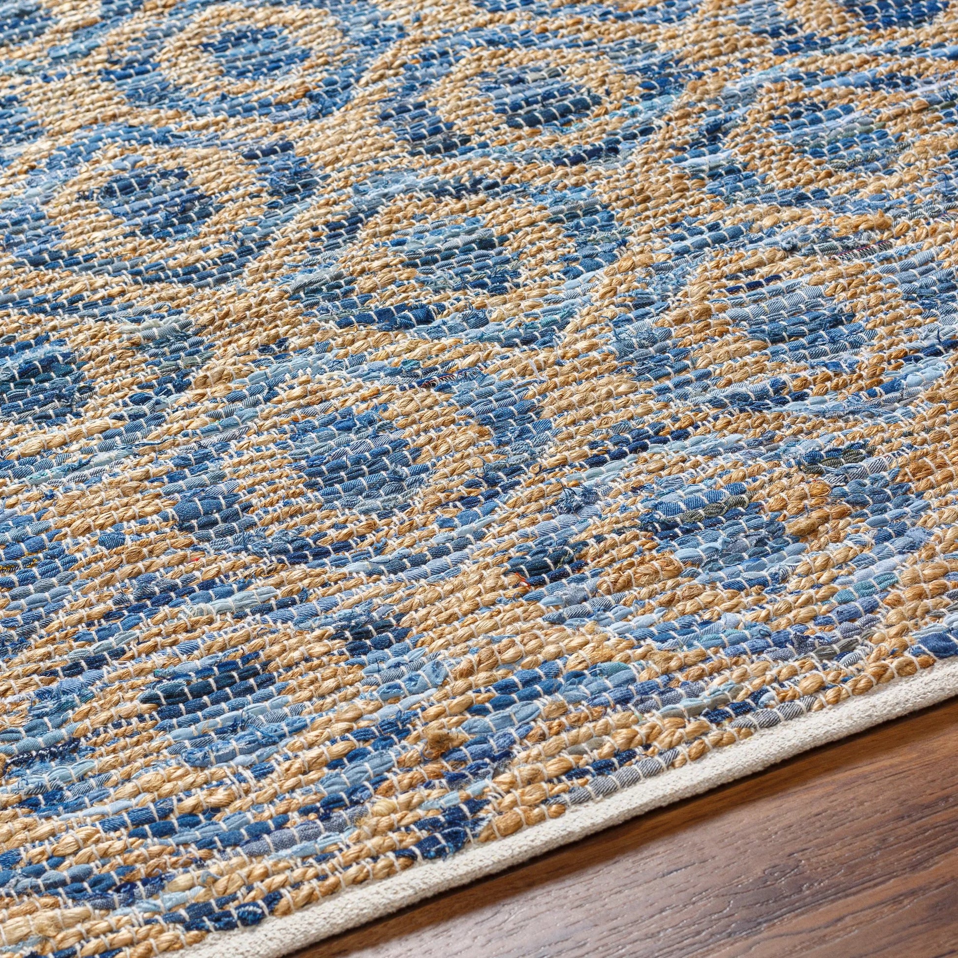 Jean Rug - 32472 by Livabliss. Made from main: 60% recycled fabric, main: 40% jute in a unique style.