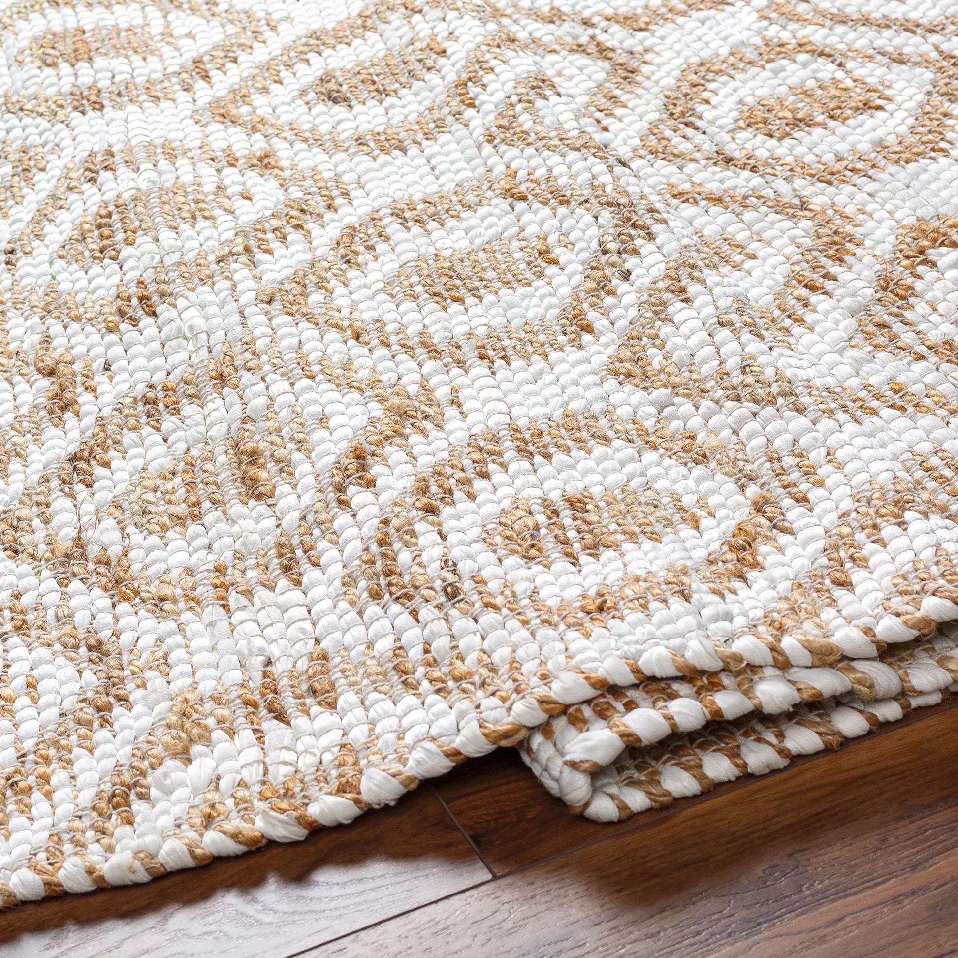 Jean Rug - 32472 by Livabliss. Made from main: 60% recycled fabric, main: 40% jute in a unique style.
