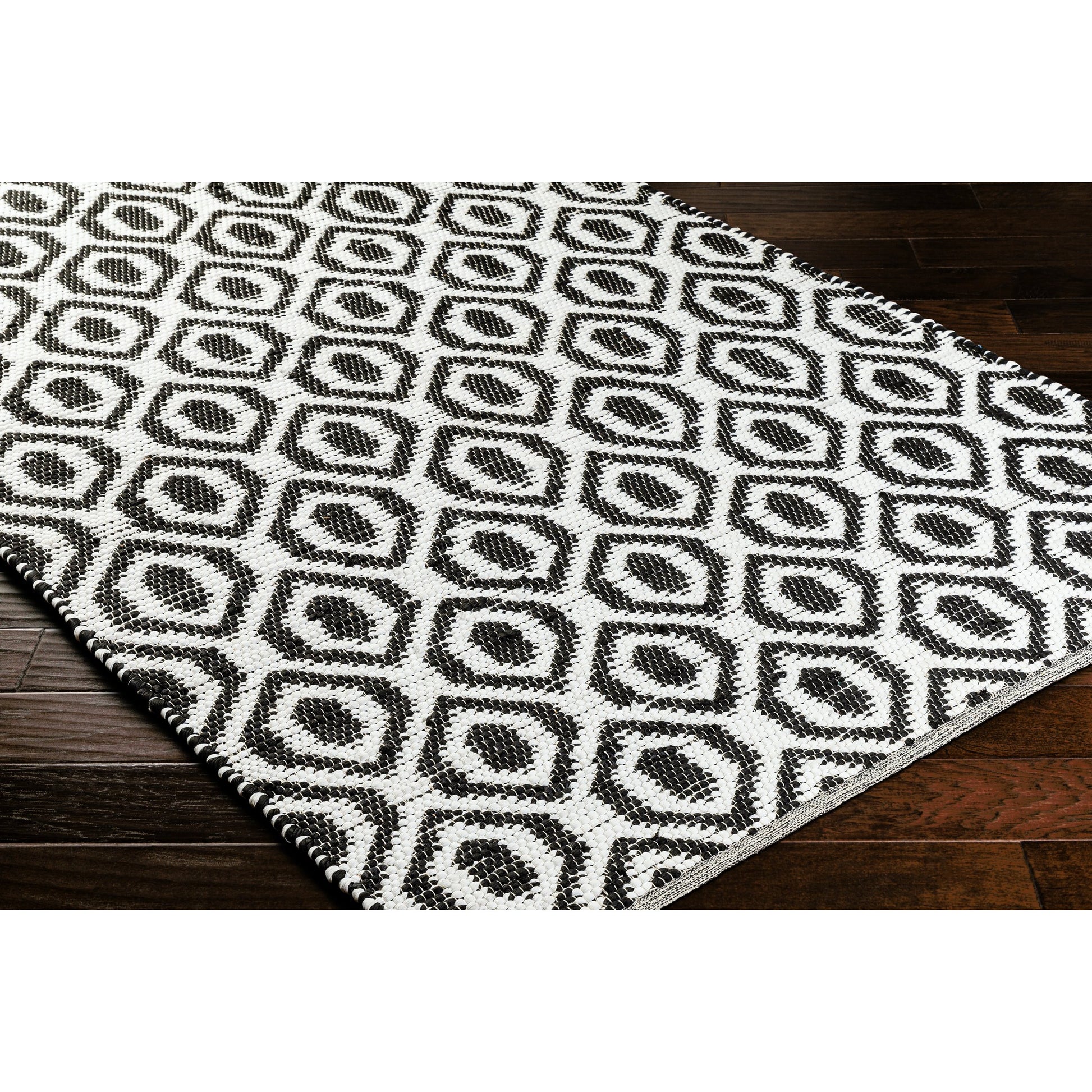 Jean Rug - 32473 by Livabliss in ivory, black. Made from main: 100% recycled fabric in a unique style.