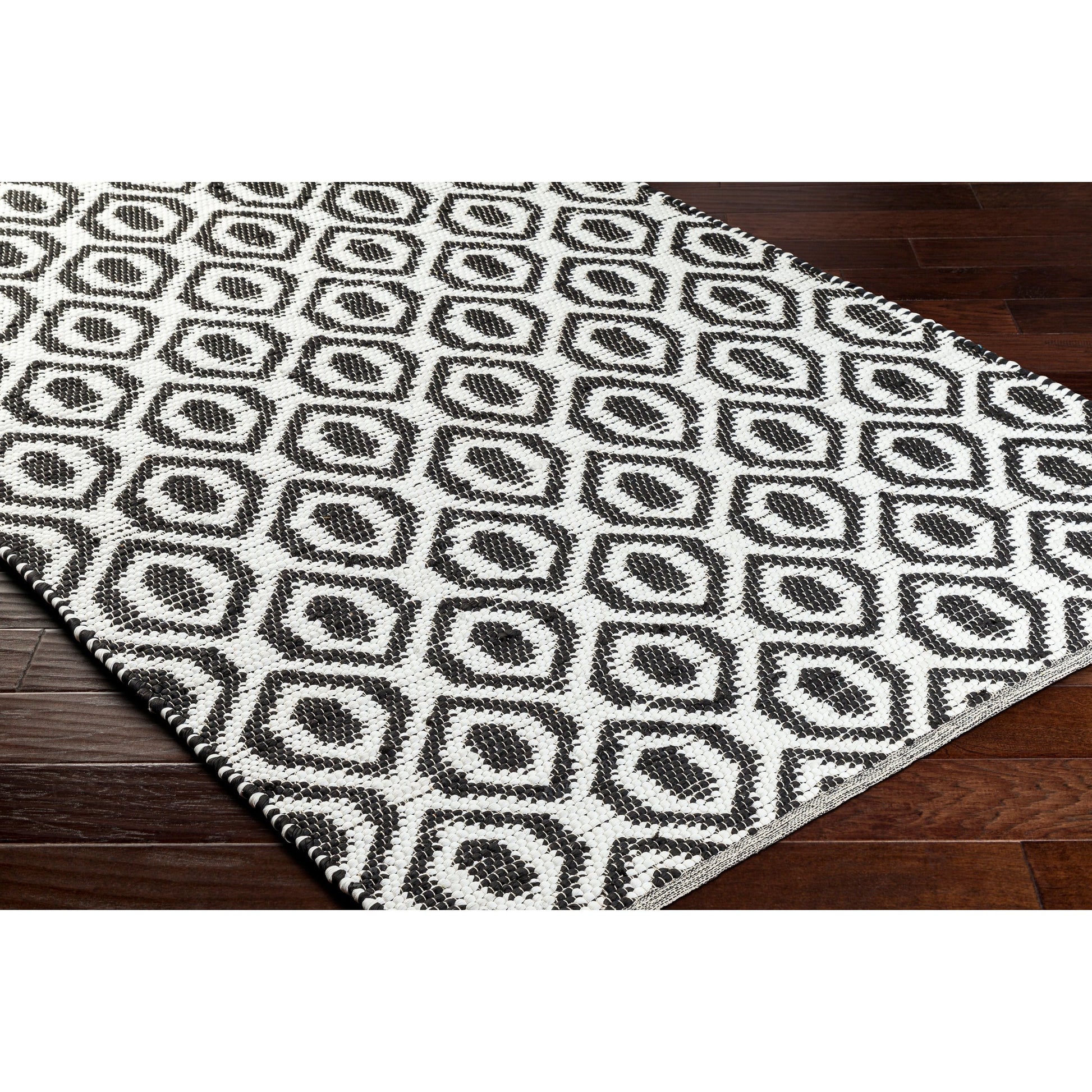 Jean Rug - 32473 by Livabliss in ivory, black. Made from main: 100% recycled fabric in a unique style.