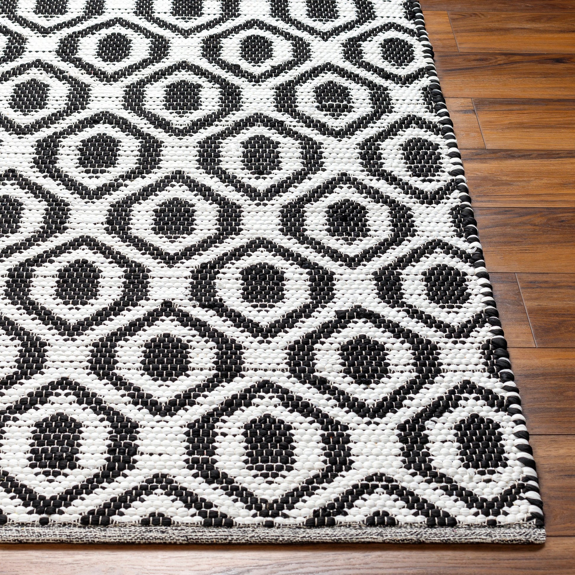 Jean Rug - 32473 by Livabliss in ivory, black. Made from main: 100% recycled fabric in a unique style.