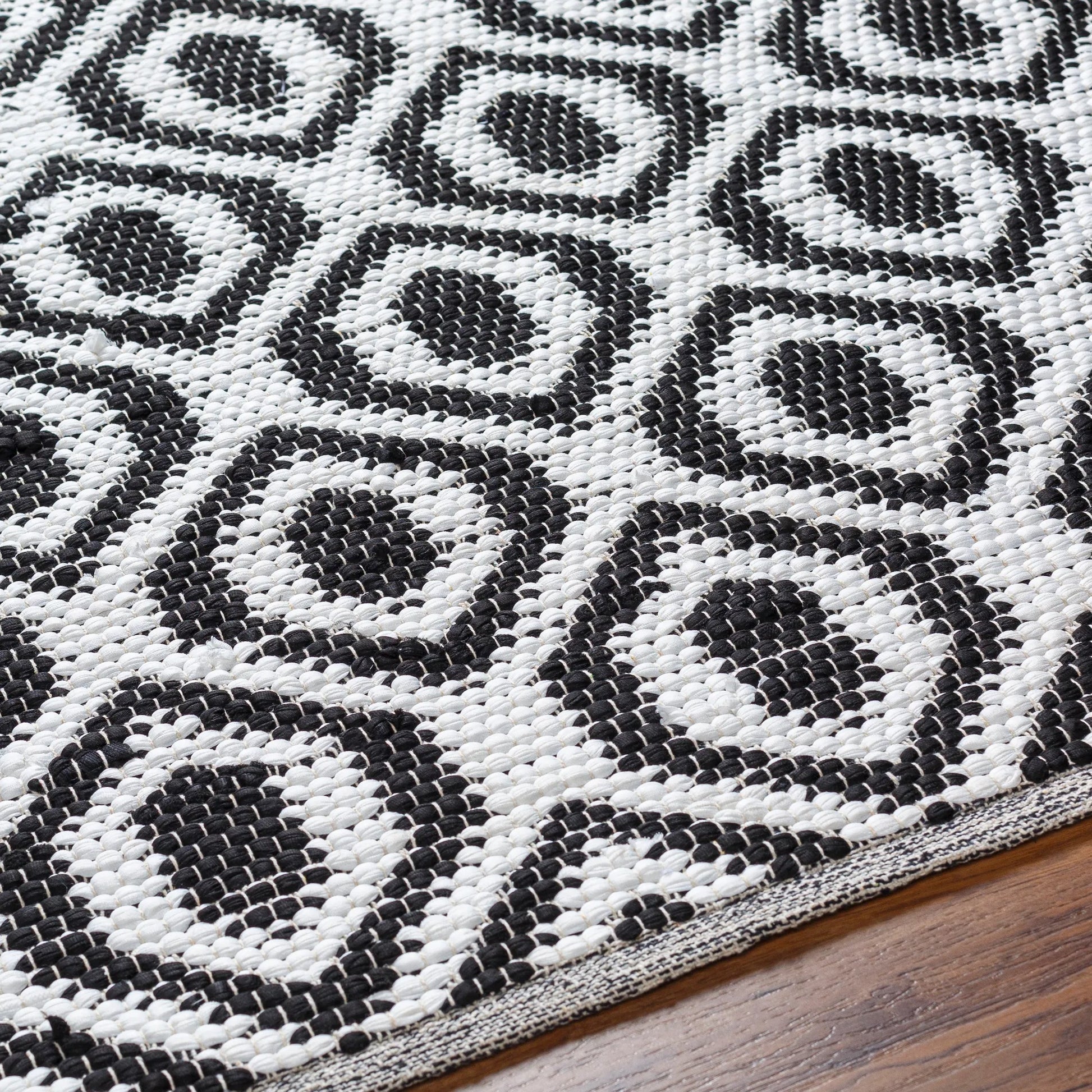 Jean Rug - 32473 by Livabliss in ivory, black. Made from main: 100% recycled fabric in a unique style.