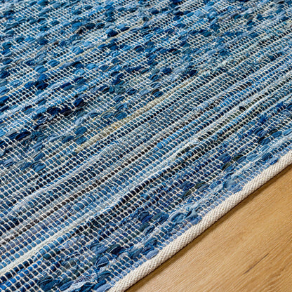 Jean Rug - 32476 by Livabliss in denim blue, slate gray, charcoal, sky blue, steel blue. Made from main: 100% recycled fabric in a unique style.