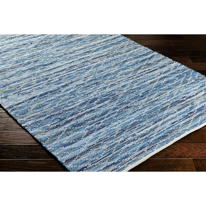 Jean Rug - 32477 by Livabliss in tan, beige, dark blue, blue, light blue. Made from main: 100% recycled fabric in a unique style.