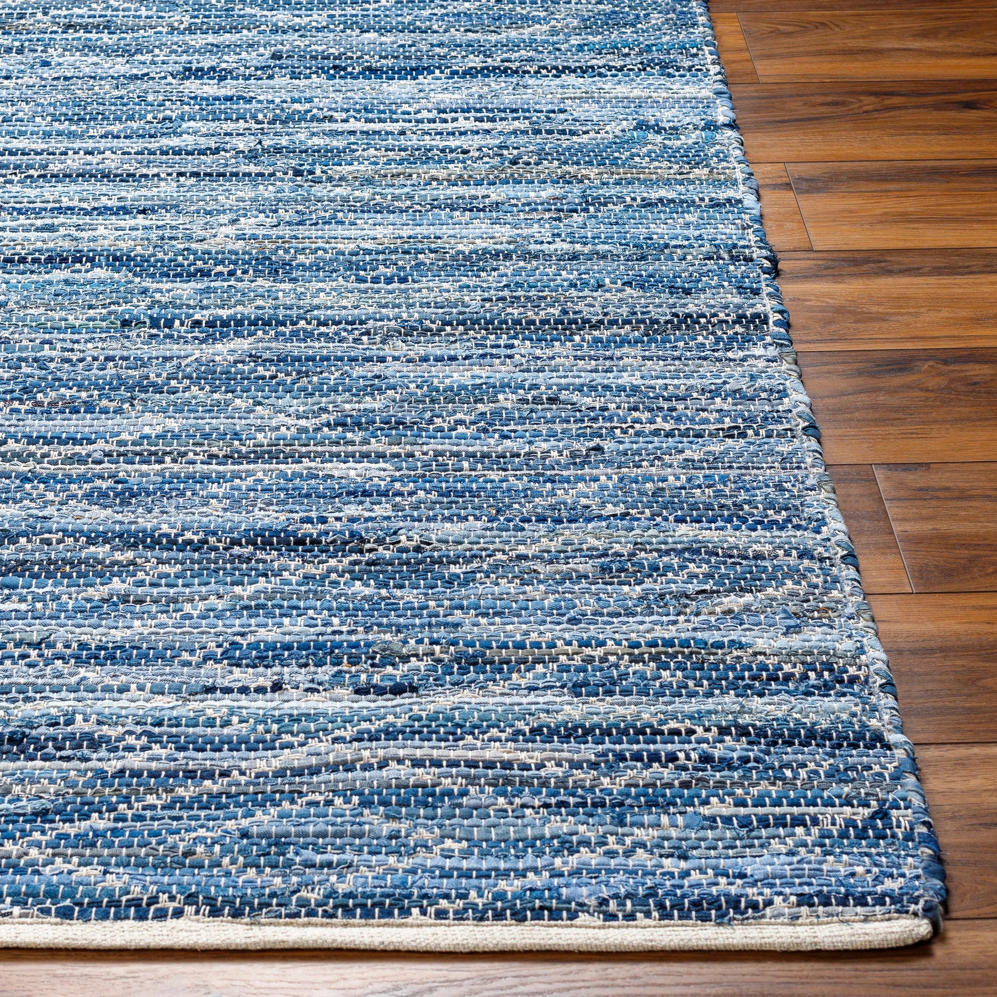 Jean JEA-2313 Rug by Livabliss in tan, beige, dark blue, blue, light blue. Made from main: 100% recycled fabric in a unique style.