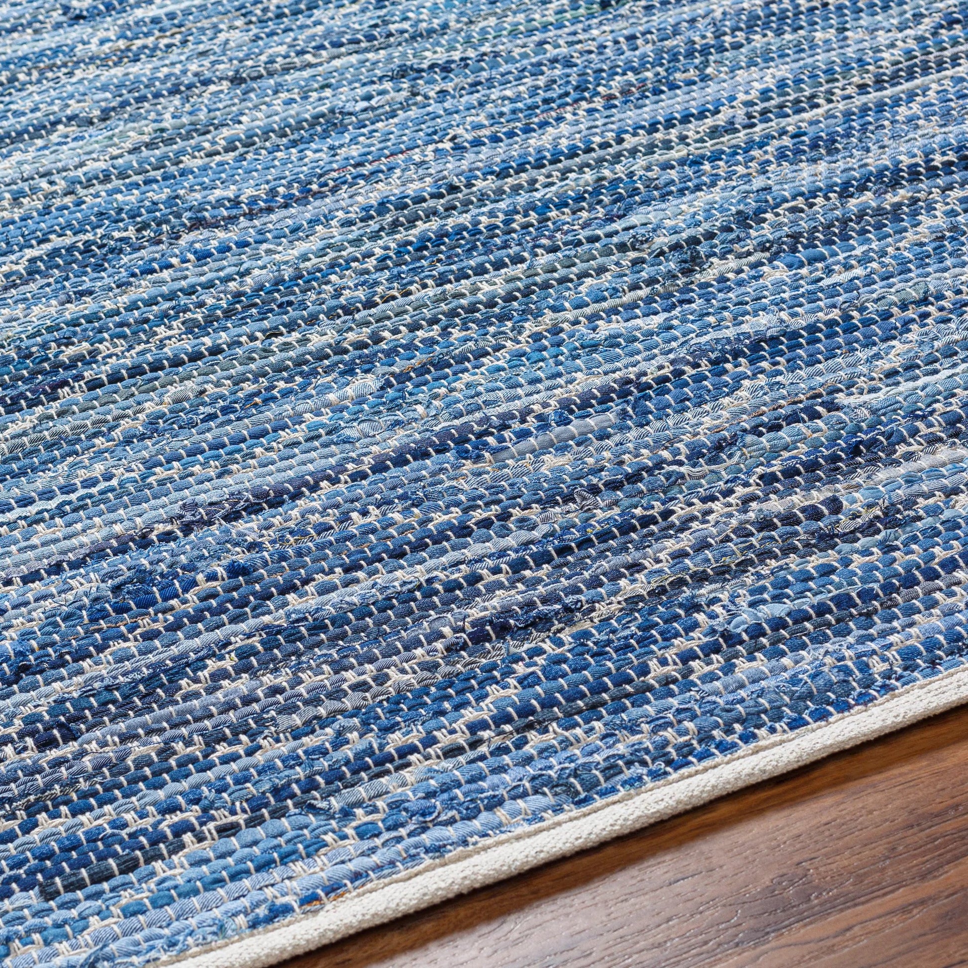 Jean Rug - 32477 by Livabliss in tan, beige, dark blue, blue, light blue. Made from main: 100% recycled fabric in a unique style.