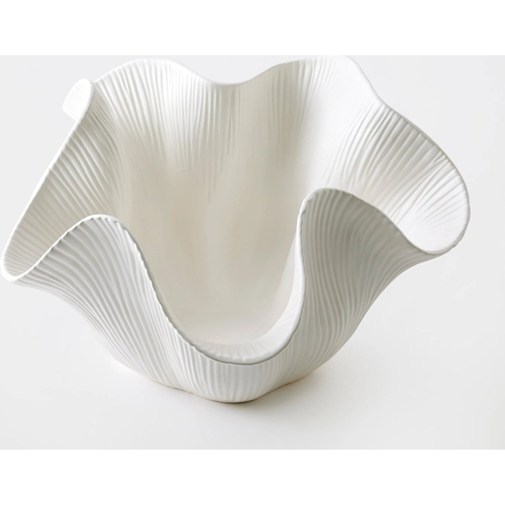 Scallop Bowl by Global Views. Made from ceramic in a modern style.